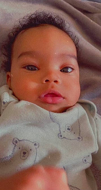 Rahmond Jr. joined the competition — help win amazing prizes! baby, baby_toddler_clothing, cheek, child, close_up, eyebrow, eyelash, forehead, head, iris, linens, lip, mouth, no_expression, nose, person, pink, portrait_photography, skin, sleeve