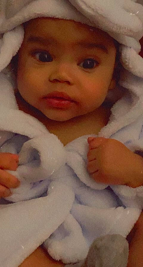 Rahmond Jr. is registered to the contest to win money with this photo: arm, cheek, chin, comfort, dress, eye, eyebrow, eyelash, face, finger, gesture, hand, headgear, headwear, iris, lip, nose, person, skin, textile