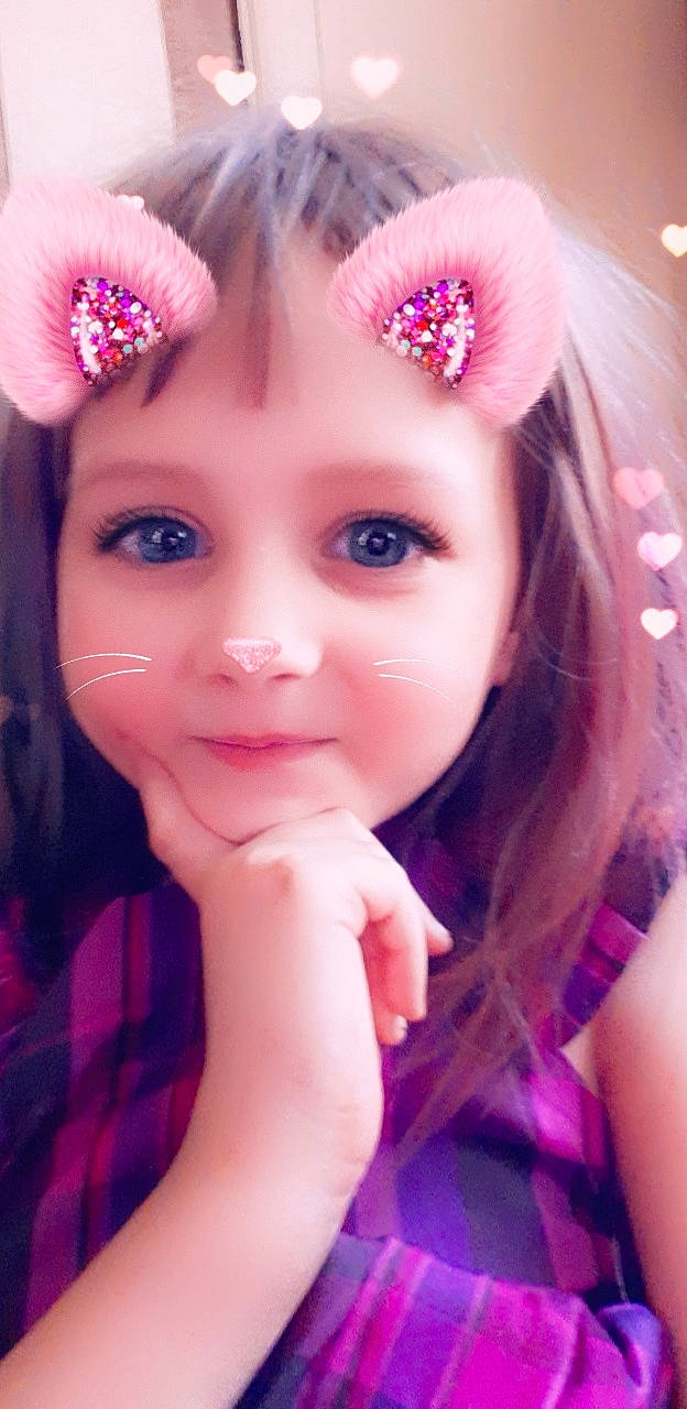 Sage is registered to the contest to win money with this photo: beauty, cheek, child, child_model, eye, eyebrow, eyelash, face, fashion_accessory, forehead, hair, hair_accessory, hairstyle, head, headpiece, joy, lavender, lip, person, pink