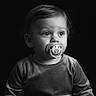 Zaydyn joined the competition — help win amazing prizes! baby, child, pacifier, portrait, black_and_white, infant, cute, clothing, face, head, eyes, expression, sitting, soft_texture, studio, young_child, monochrome, innocence, person, closeup