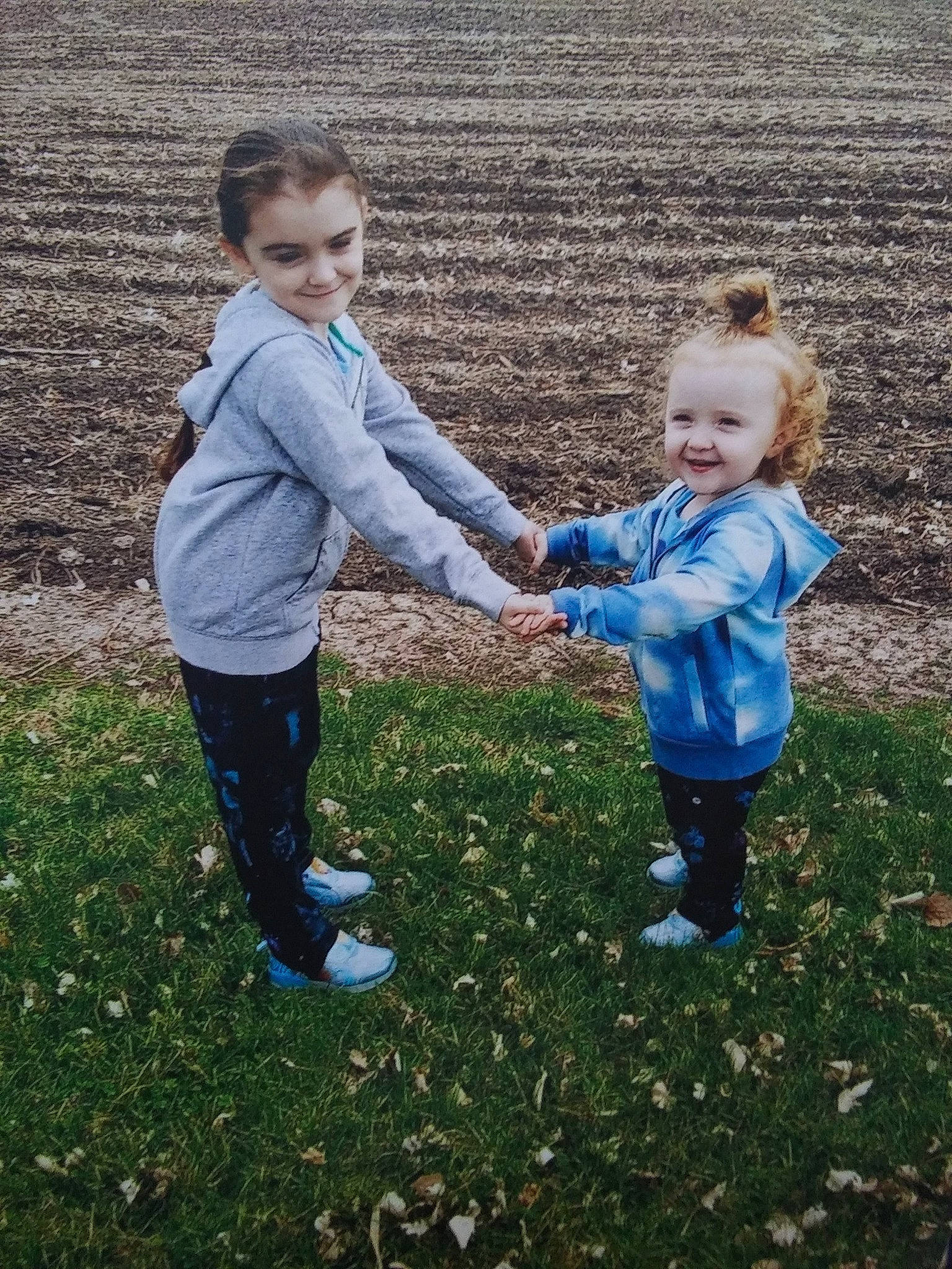 Kamryn joined the competition — help win amazing prizes! child, family, fun, gesture, grass, joy, outerwear, people, people_in_nature, person, photography, plant, play, sibling, smile, standing, toddler