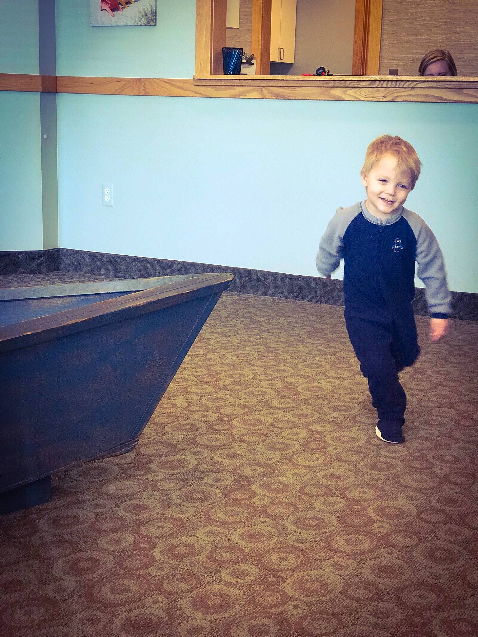 Tj is registered to the contest to win money with this photo: blue, carpet, child, cloud, electronic_device, floor, flooring, fun, home, joy, leg, person, play, recreation, room, shoe, sky, square, standing, toddler