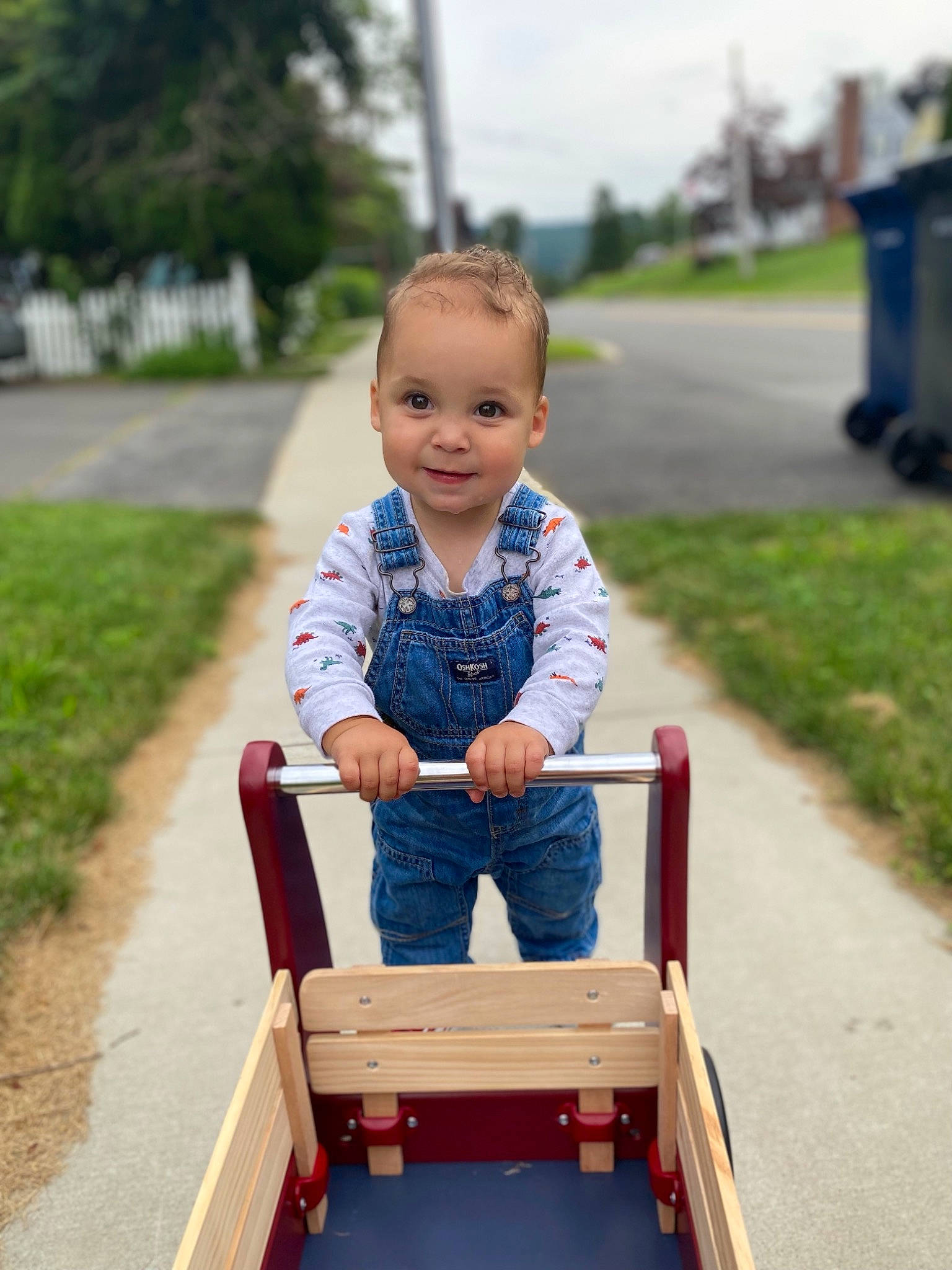 Noah is registered to the contest to win money with this photo: baby, baby_toddler_clothing, dress, face, fun, grass, happy, jeans, joy, leisure, people_in_nature, person, plant, skin, sky, sleeve, smile, summer, t_shirt, toddler