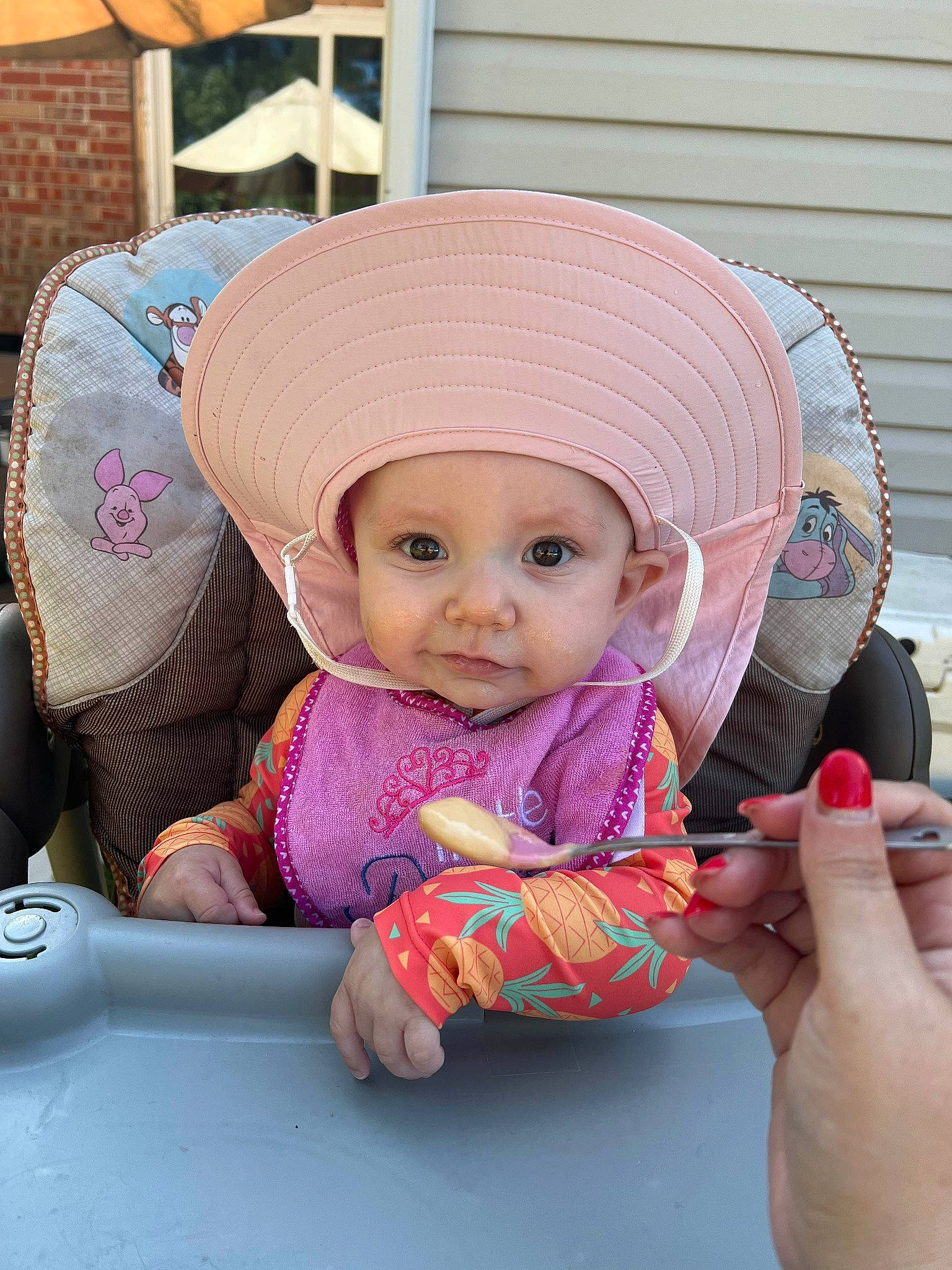Grace joined the competition — help win amazing prizes! baby, baby_products, baby_toddler_clothing, cap, cheek, child, comfort, fashion_accessory, fun, happy, headgear, headwear, magenta, outerwear, pattern, person, pink, sitting, skin, sleeve