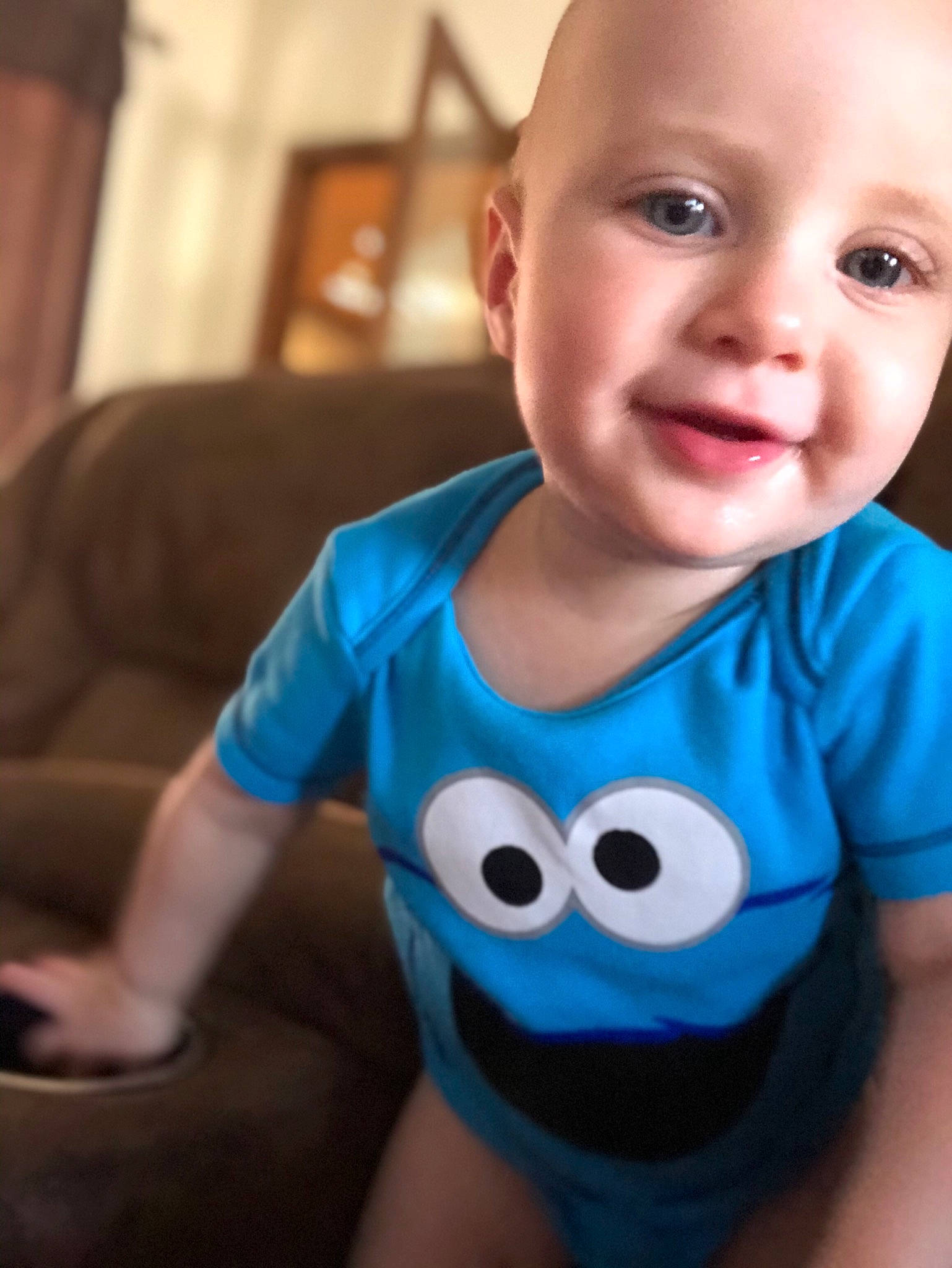 Kinsley is registered to the contest to win money with this photo: arm, baby, baby_toddler_clothing, blue, cheek, child, chin, cool, eye, face, facial_expression, head, lip, mouth, nose, person, product, skin, smile, toddler