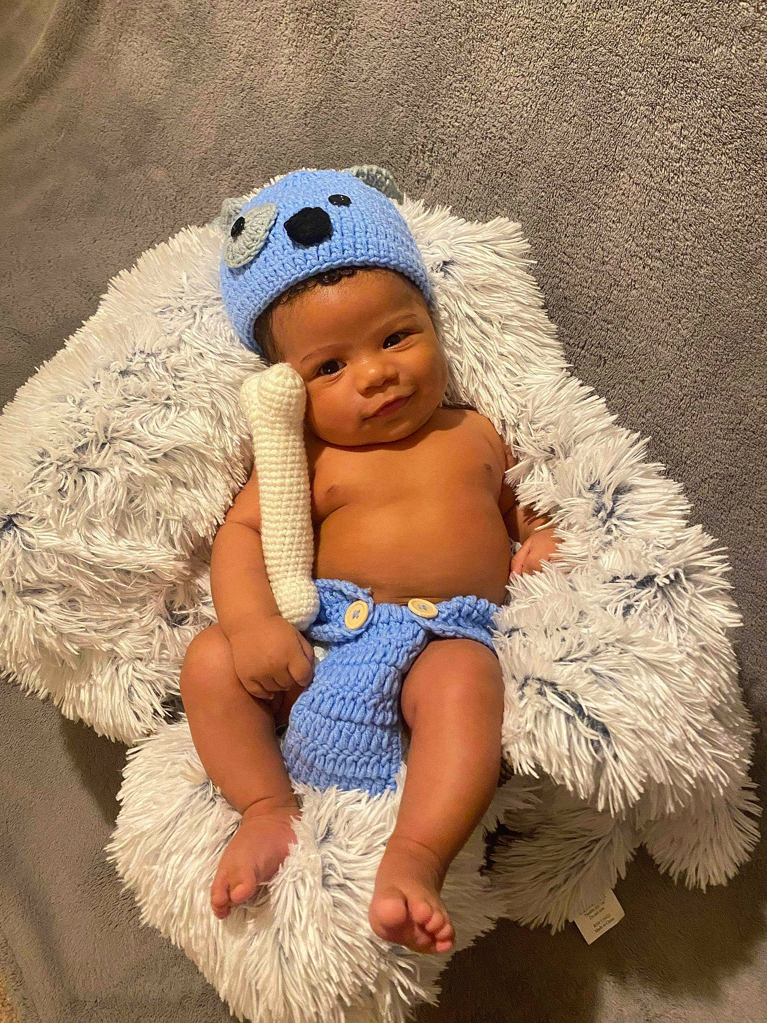 Alec joined the competition — help win amazing prizes! abdomen, baby, baby_products, baby_toddler_clothing, beanie, bonnet, child, costume, costume_accessory, costume_hat, fur, hair_accessory, headpiece, headwear, human, natural_material, person, stomach, textile, toddler