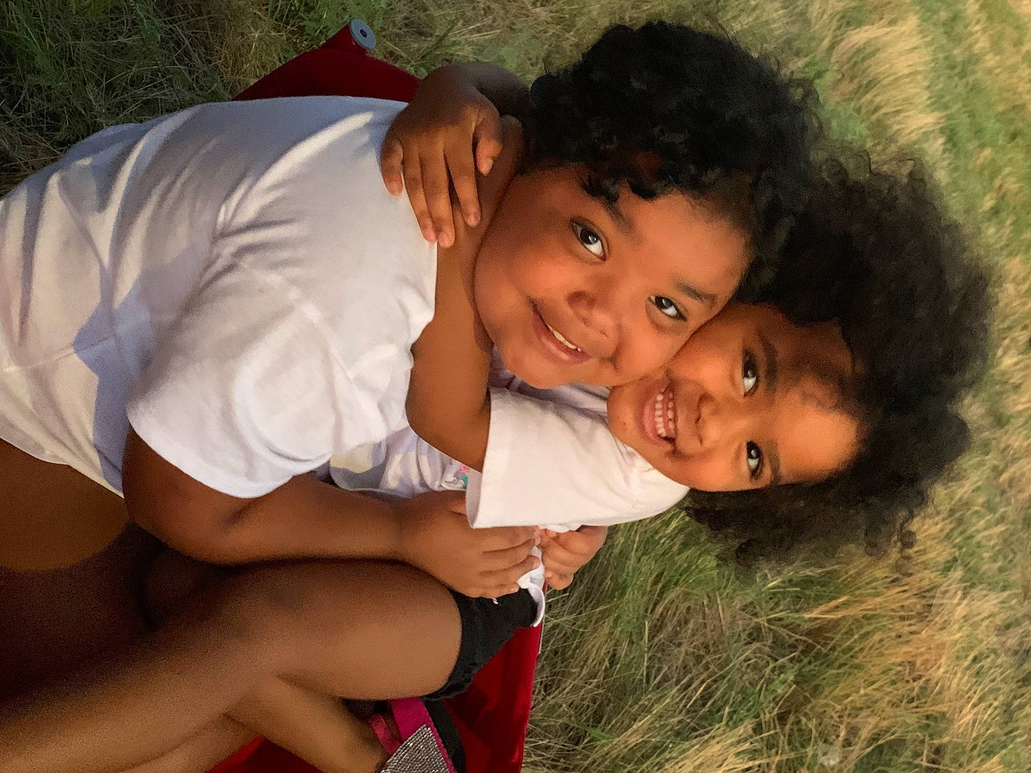 Zendaya joined the competition — help win amazing prizes! black_hair, child, facial_expression, flash_photography, friendship, fun, gesture, grass, happy, human_body, interaction, joy, leisure, people_in_nature, person, plant, shorts, skin, smile, summer