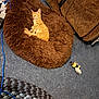 Oliver is registered to the contest to win money with this photo: kitten, orange_cat, sleeping, pet_bed, fluffy, carpet, couch, indoor, toy, cord, relaxed, cozy, feline, resting, home, cute, small, fur, domestic_cat, animal