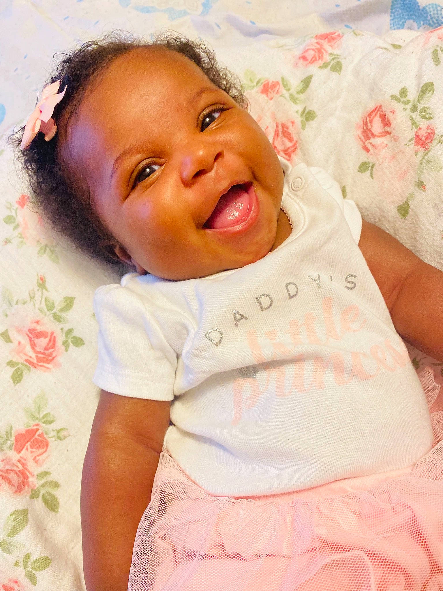 Makenzie is registered to the contest to win money with this photo: arm, baby_toddler_clothing, cheek, chin, comfort, eye, face, facial_expression, happy, head, iris, lip, mouth, neck, nose, person, pink, product, skin, sleeve