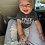 Khari joined the competition — help win amazing prizes! baby, smiling, infant, person, car_interior, baby_bottle, clothing, necklace, socks, lap, happy, cute, seat, casual_wear, child, portrait, human, transport, joyful, sitting