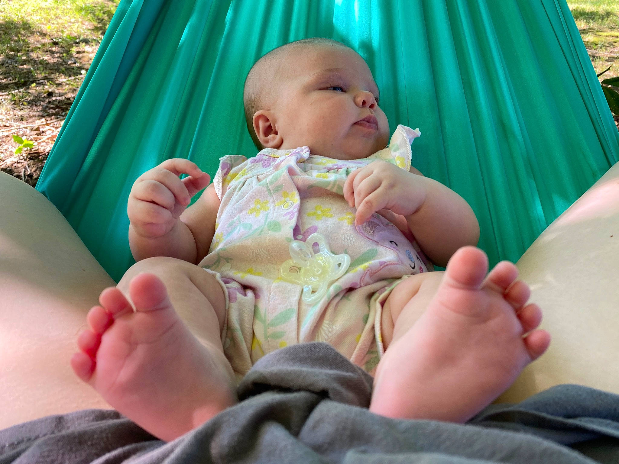 Timber joined the competition — help win amazing prizes! baby, barefoot, comfort, finger, gesture, grass, green, happy, human_body, joint, lap, leg, leisure, mouth, people_in_nature, person, photograph, skin, thigh, thumb