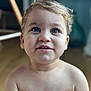 Marceau participe au concours pour gagner de l'argent avec cette photo : baby, background_blur, bare_shoulders, blond_hair, blue_eyes, child, close_up, curious_expression, cute, face, head_and_shoulders, indoor, innocent, looking_up, person, portrait, skin, soft_light, toddler, young_child