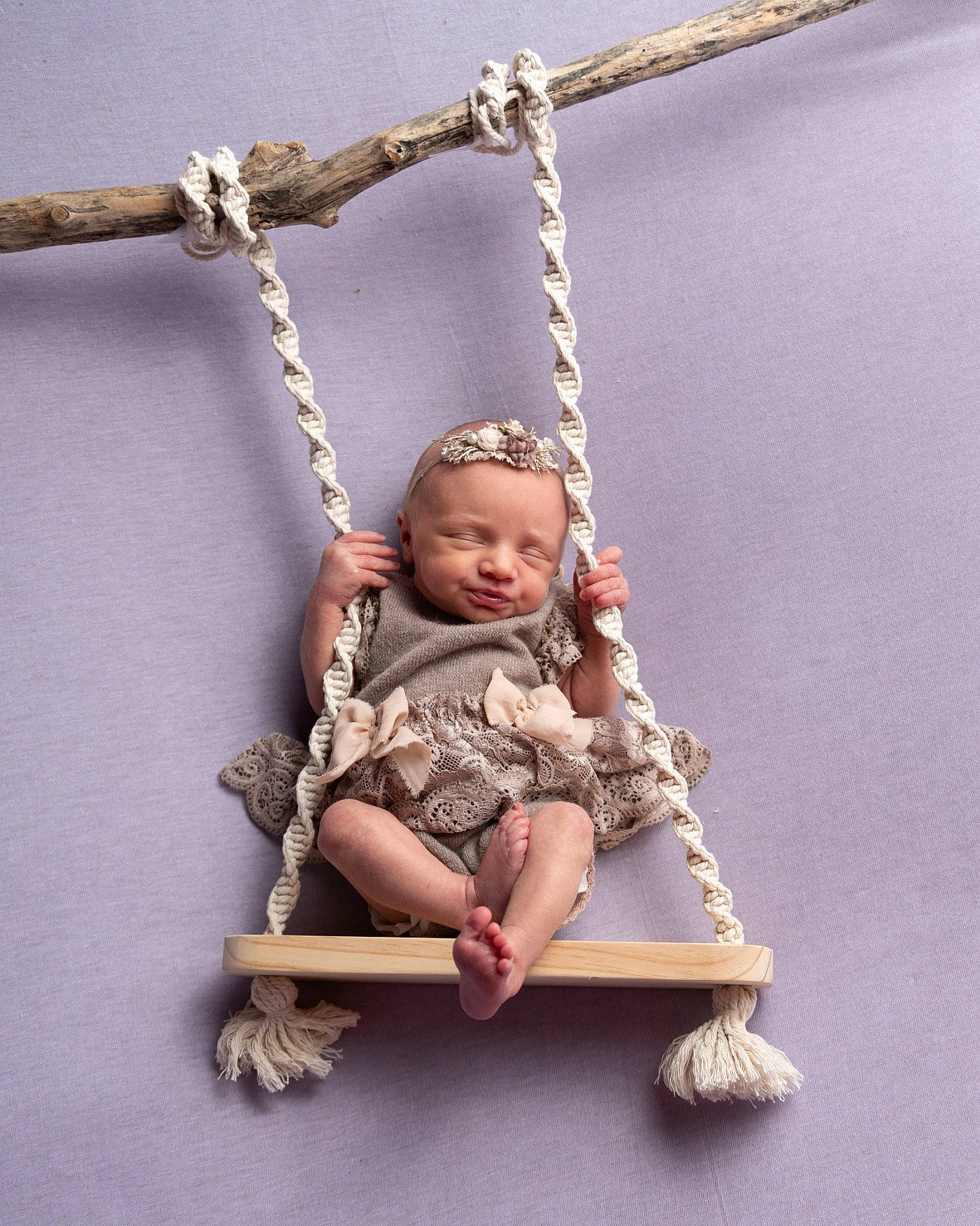 Rosalee is registered to the contest to win money with this photo: baby, baby_products, chain, child, electric_blue, fashion_accessory, fun, hand, jewellery, leisure, metal, person, sitting, swing, toddler, twig, wood
