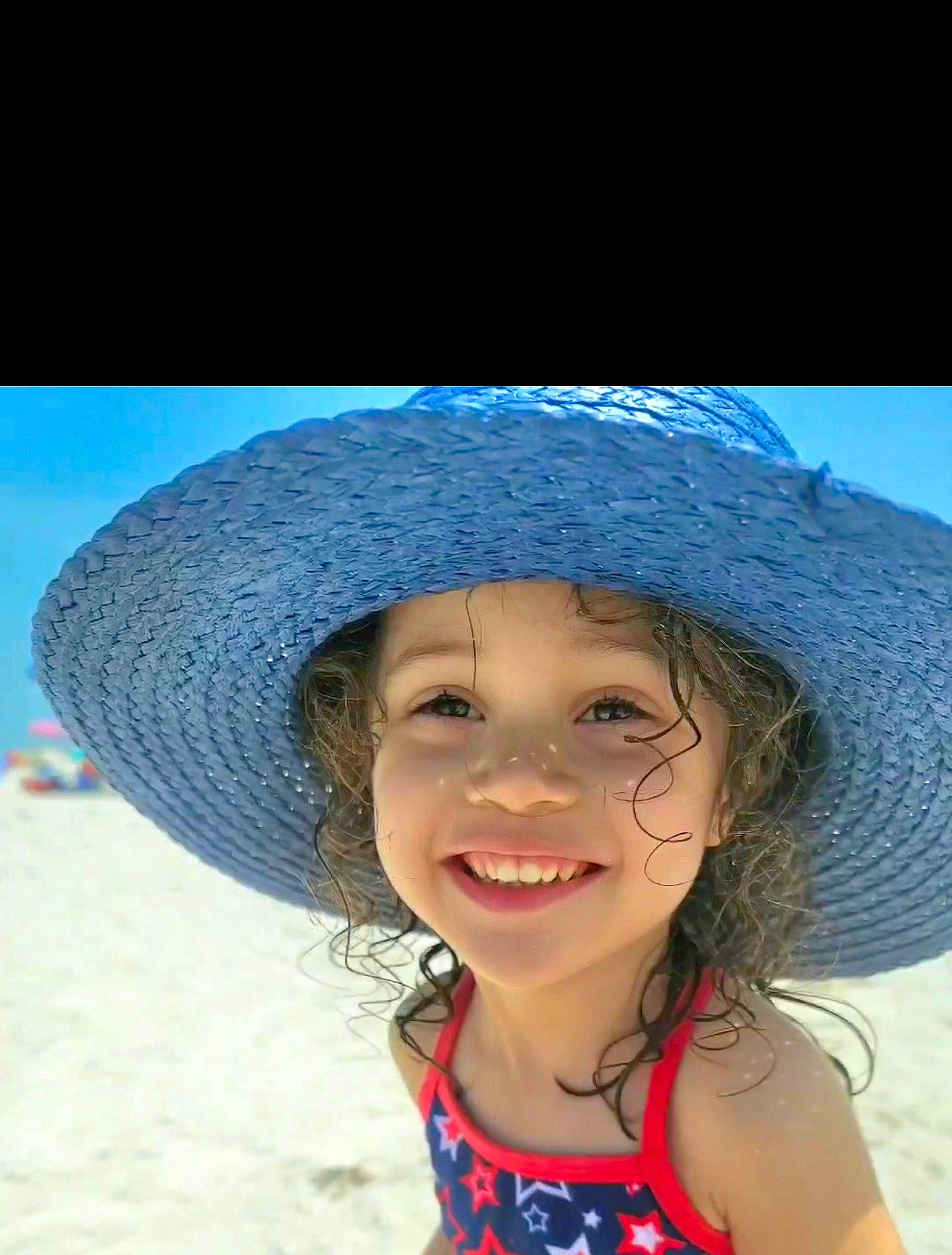 Elizabeth joined the competition — help win amazing prizes! azure, beach, cap, child, cool, electric_blue, face, flash_photography, fun, happy, hat, headgear, headwear, joy, leisure, lip, people_in_nature, people_on_beach, person, smile