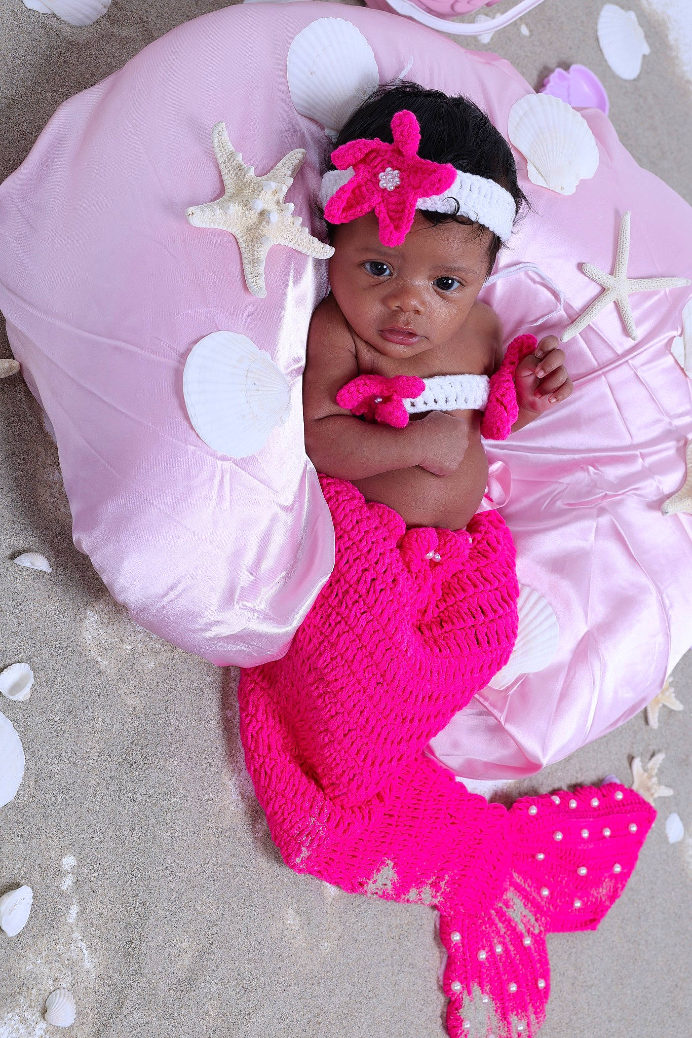 Ana is registered to the contest to win money with this photo: baby, baby_products, baby_toddler_clothing, dress, fashion_accessory, flower, hair_accessory, happy, hat, headband, headgear, headpiece, headwear, magenta, person, petal, pink, purple, sleeve, textile