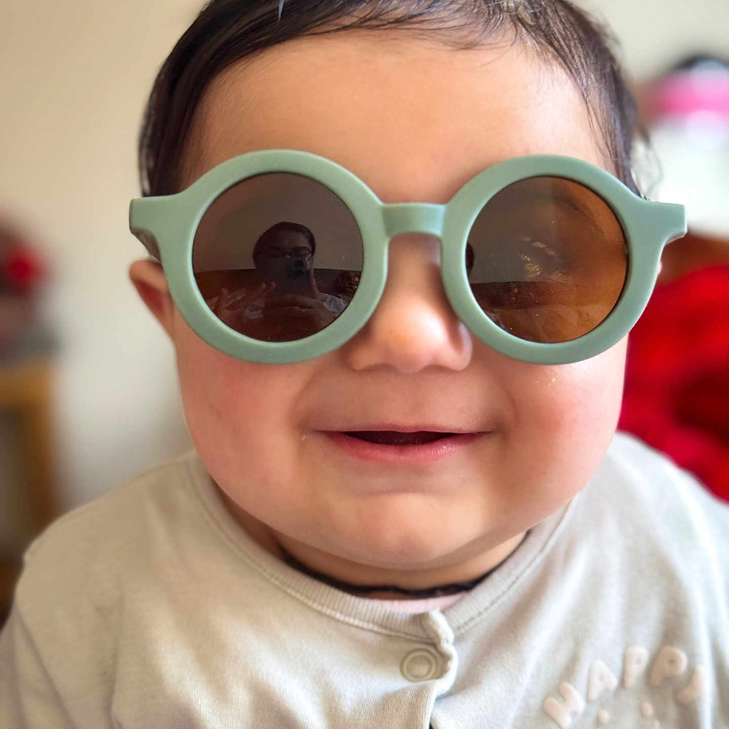 Arhaan is registered to the contest to win money with this photo: accessories, baby, bodypart, face, finger, glasses, goggles, hand, happy, head, person, photography, portrait, selfie, smile, sunglasses