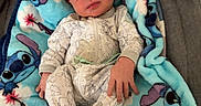 Alban joined the competition — help win amazing prizes! baby, blanket, blue, cartoon, child, comfort, cozy, cute, fabric, face, floral, footed_pajamas, hand, indoor, infant, newborn, onesie, portrait, sleeping_bed, soft