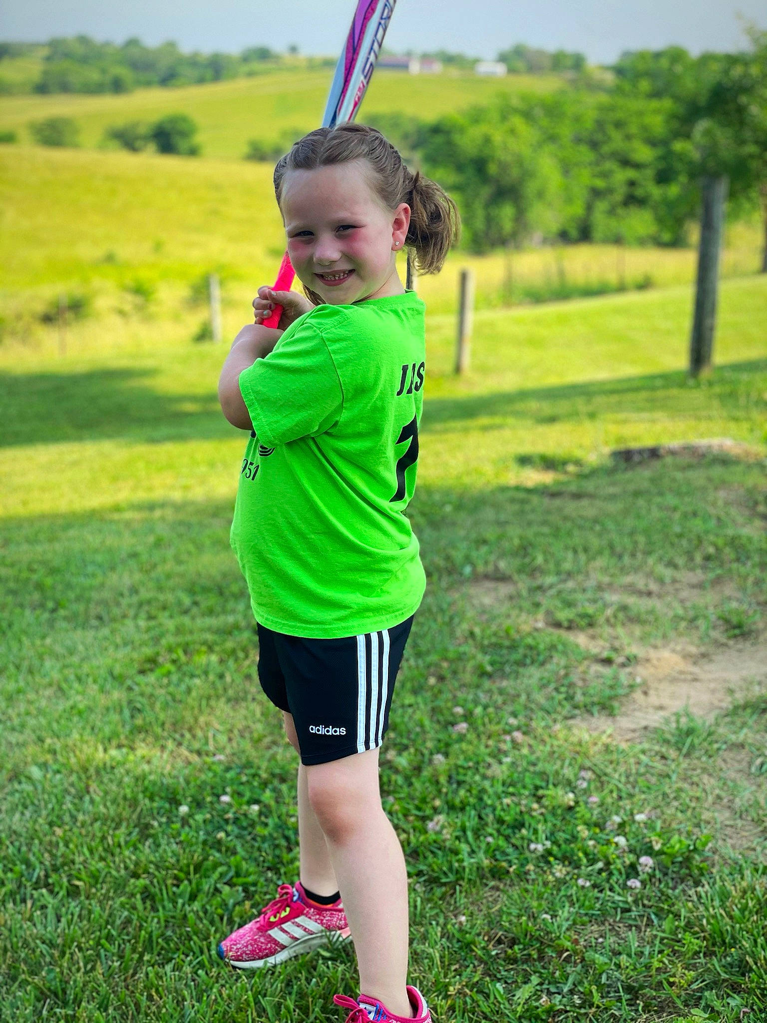 Jasmine joined the competition — help win amazing prizes! electric_blue, fun, grass, grass_family, grassland, green, happy, joy, landscape, leisure, meadow, people_in_nature, person, recreation, shorts, sky, smile, sportswear, sweatpant, t_shirt