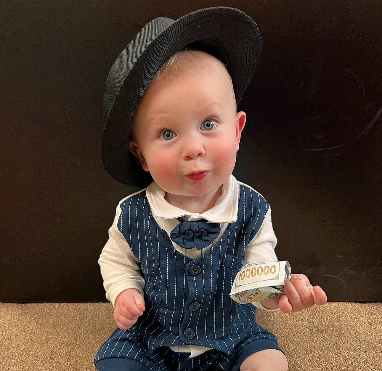 Andy is registered to the contest to win money with this photo: baby, baby_toddler_clothing, beauty, cap, cheek, child, eye, flash_photography, fun, happy, hat, iris, lip, outerwear, person, skin, sleeve, smile, standing, sun_hat