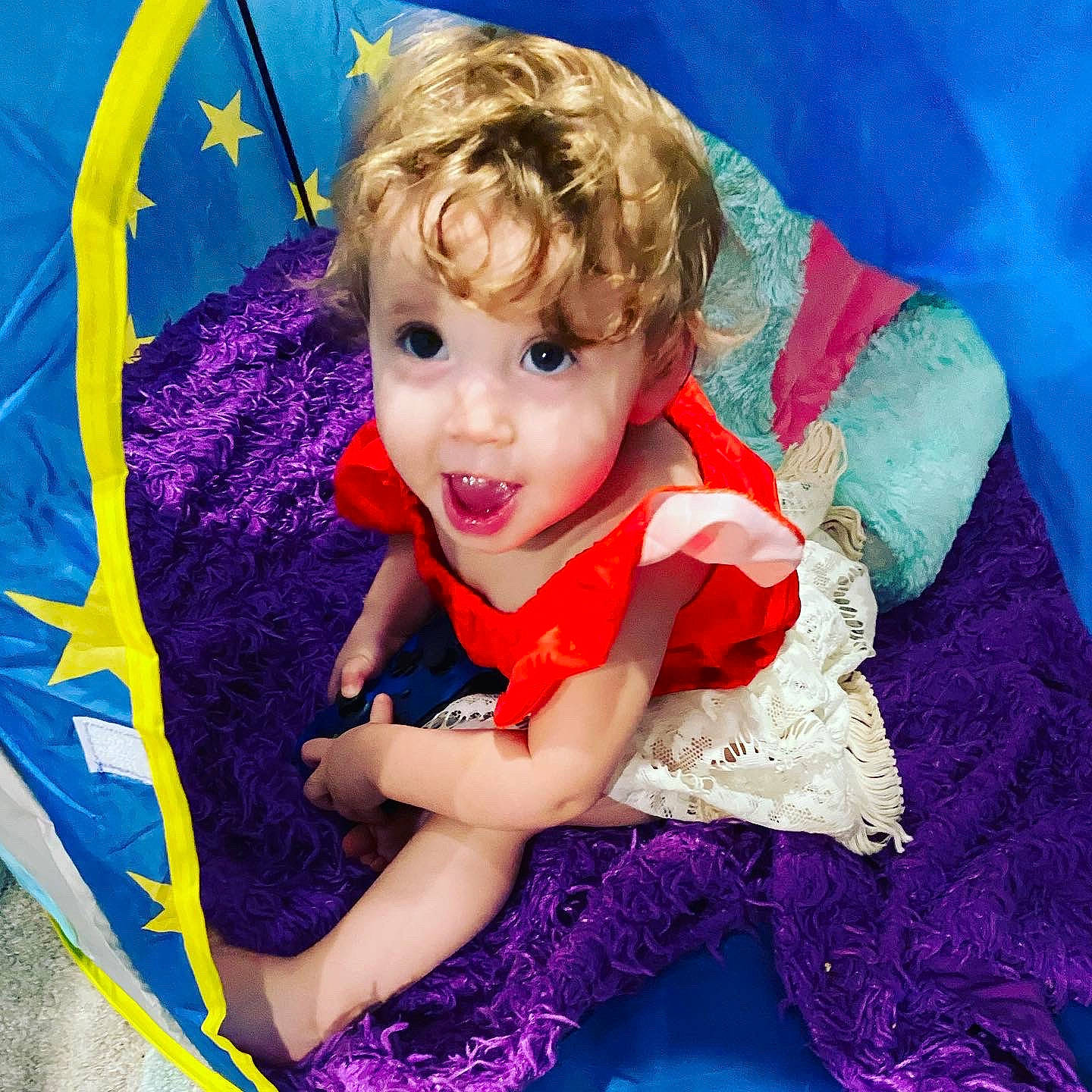Lacey Jo is registered to the contest to win money with this photo: azure, baby, baby_toddler_clothing, blue, cheek, child, electric_blue, eye, grass, happy, head, iris, magenta, person, pink, play, purple, skin, smile, toddler