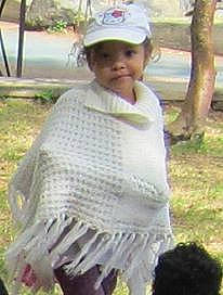 Craissy participe au concours pour gagner de l'argent avec cette photo : adaptation, child, clothing, crochet, headwear, knitting, neck, outerwear, pattern, person, poncho, shawl, textile, toddler, wool