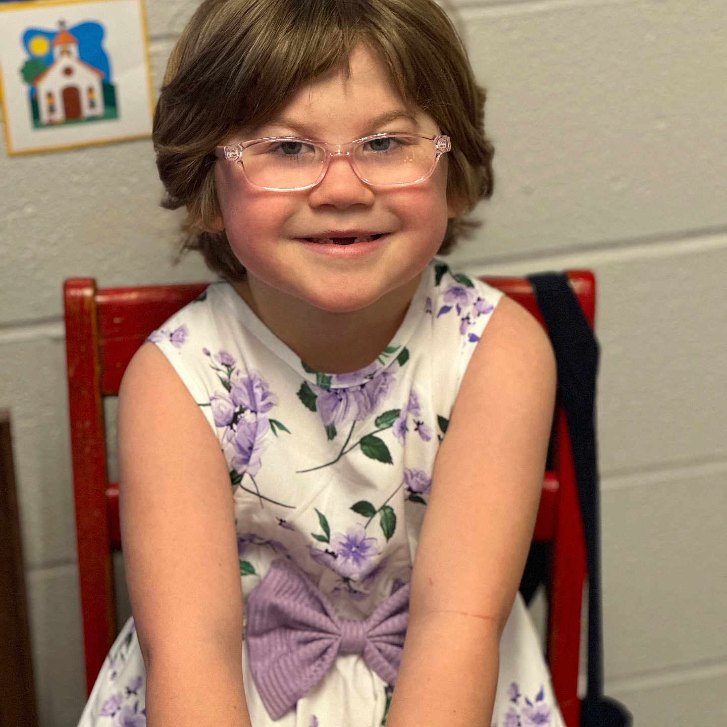 Clarke is registered to the contest to win money with this photo: accessories, blouse, child, clothing, dress, earring, face, female, formalwear, furniture, girl, glasses, happy, head, jewelry, necklace, person, photography, portrait, smile