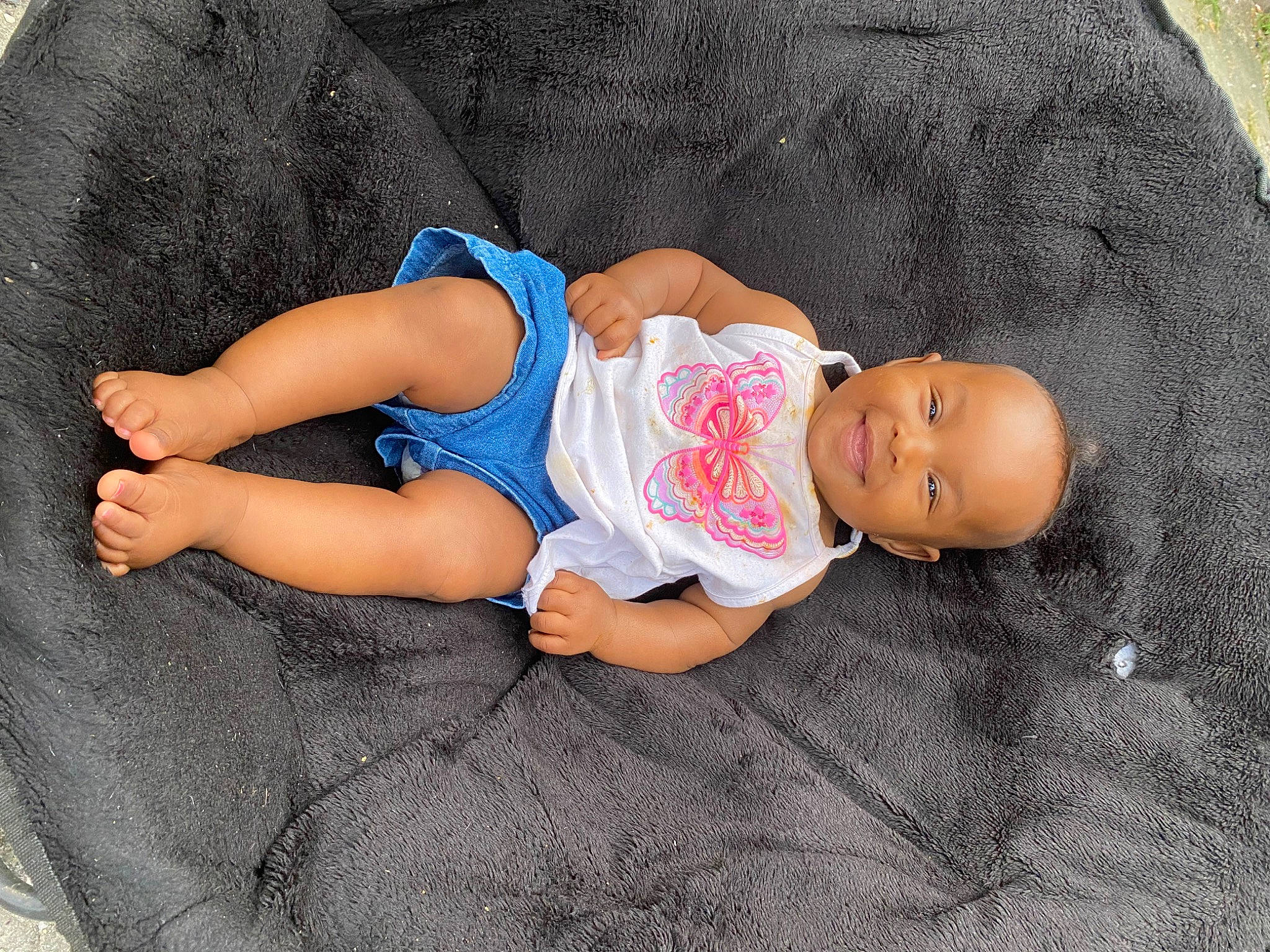 Kamari is registered to the contest to win money with this photo: baby, baby_sleeping, baby_toddler_clothing, cheek, child, comfort, eye, finger, hand, headgear, human_body, infant_bodysuit, joy, leg, person, product, skin, sleeve, sock, textile
