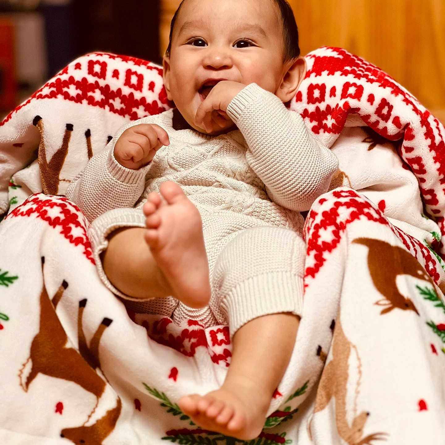 Mateo joined the competition — help win amazing prizes! baby, babylaughing, blanket, bodypart, clothing, face, finger, furniture, hand, happy, head, knitwear, laughing, newborn, person, photography, portrait, quilt, smile, towel