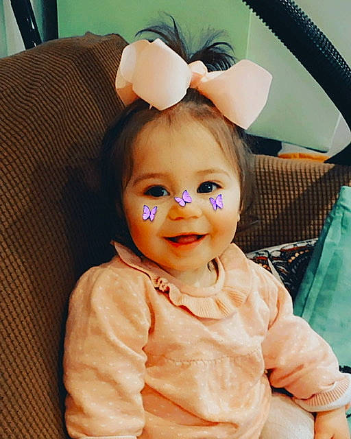 Leyla is registered to the contest to win money with this photo: baby, baby_toddler_clothing, cheek, comfort, cool, eye, eyelash, facial_expression, fun, hairstyle, happy, head, headgear, iris, joy, nose, person, skin, sleeve, smile