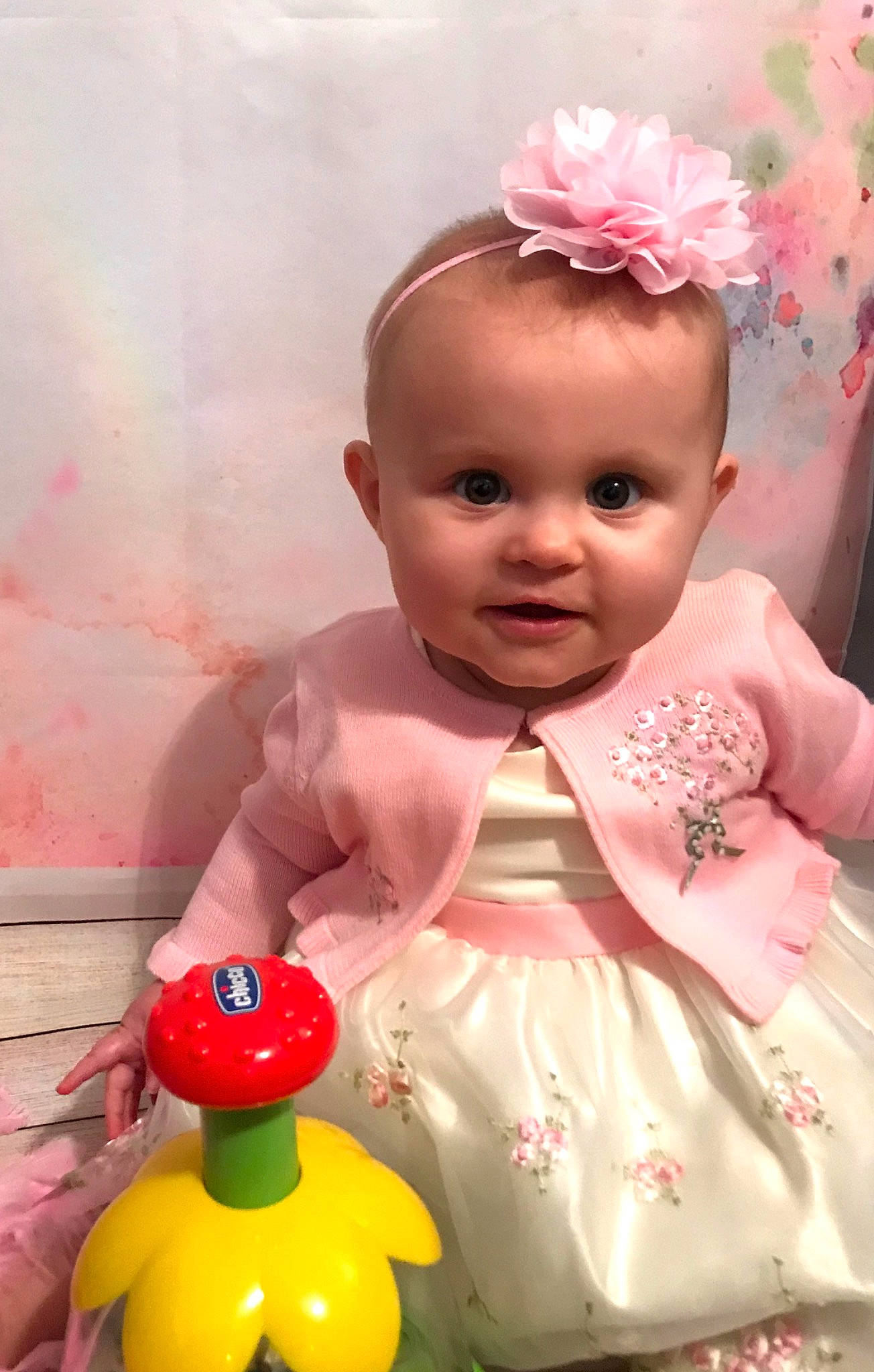 Lucie is registered to the contest to win money with this photo: baby, baby_toddler_clothing, child, hair_accessory, person, pink, toddler, toy