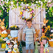 Matthew joined the competition — help win amazing prizes! child, boy, smiling, easter, bunny, flower_pot, flowers, wreath, garden, decorations, wooden_door, greenery, holiday, spring, cute, portrait, indoor, colorful, playful, festive