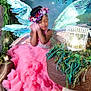 Jamie is registered to the contest to win money with this photo: child, girl, fairy, wings, pink_dress, flower_crown, lantern, garden, flowers, greenery, magical, fantasy, portrait, smiling, costume, ribbons, nature, fairy_tale, cute, whimsical