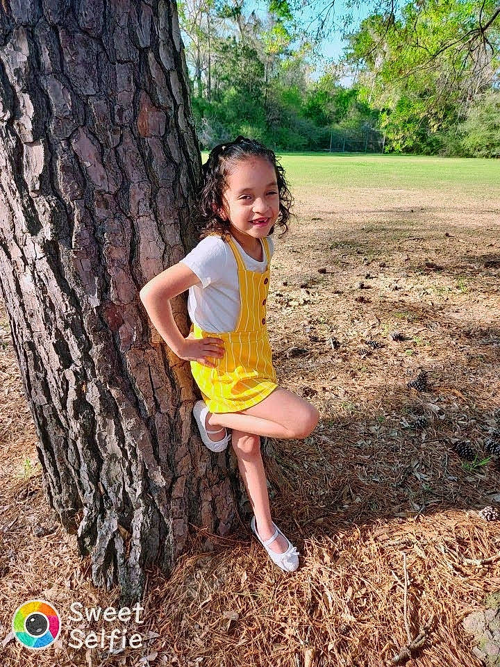 Nikkole Guadalupe Zabala joined the competition — help win amazing prizes! adaptation, branch, flash_photography, grass, happy, joy, leg, leisure, natural_environment, people, people_in_nature, person, plant, shoe, smile, summer, sunlight, thigh, tree, trunk