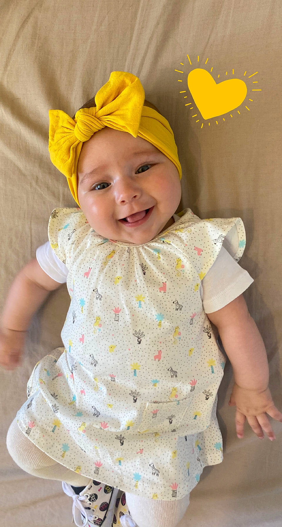 Raven participe au concours pour gagner de l'argent avec cette photo : baby, baby_toddler_clothing, cap, child, dress, happy, headgear, headpiece, headwear, joy, linens, outerwear, pattern, person, pink, product, skin, sleeve, smile, textile