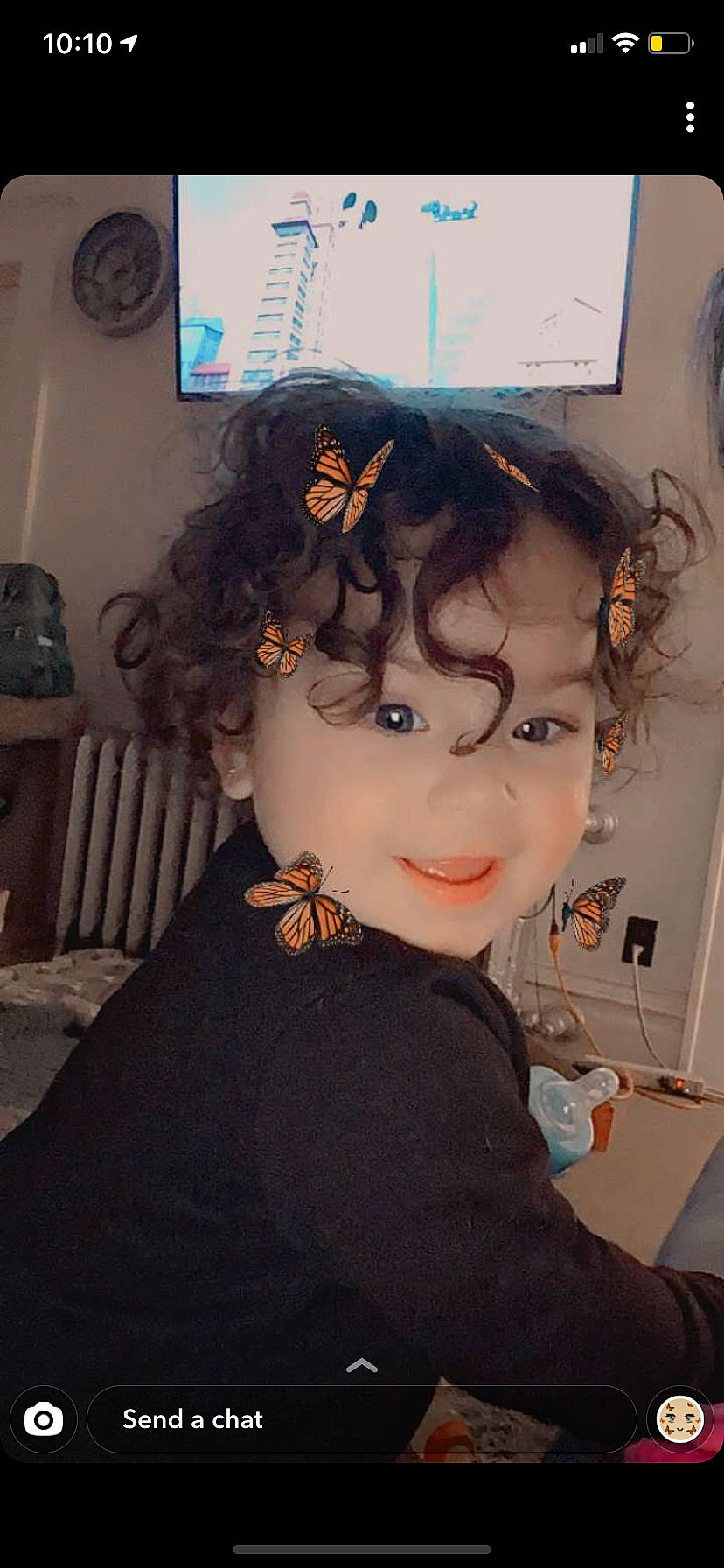 Kataleya joined the competition — help win amazing prizes! artificial_hair_integrations, black_hair, forehead, hairstyle, interior_design, living_room, person, picture_frame, portrait, toddler, wall_clock