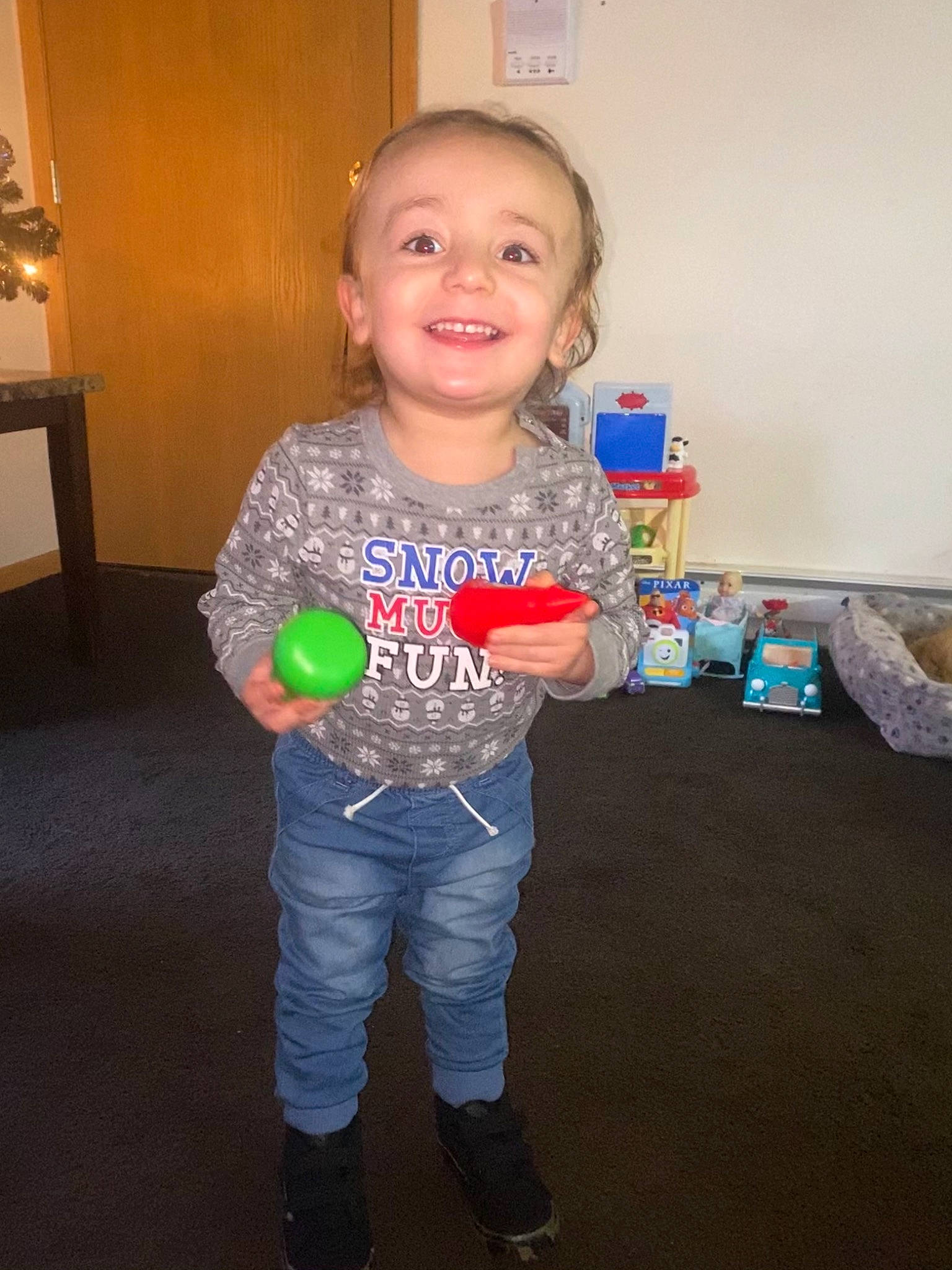 Kevin joined the competition — help win amazing prizes! baby_toddler_clothing, boot, joy, party_supply, person, plastic, play, snack, sock, standing, toddler, toy