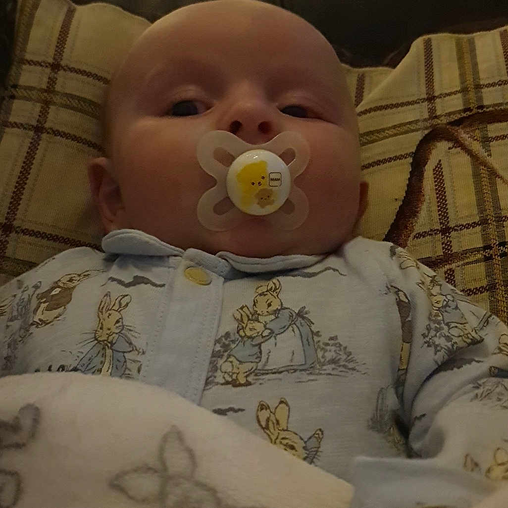 Kayden is registered to the contest to win money with this photo: baby, baby_products, baby_safety, baby_sleeping, baby_toddler_clothing, bedtime, cheek, child, comfort, eye, facial_expression, happy, human_body, iris, linens, mouth, nose, skin, textile, toddler
