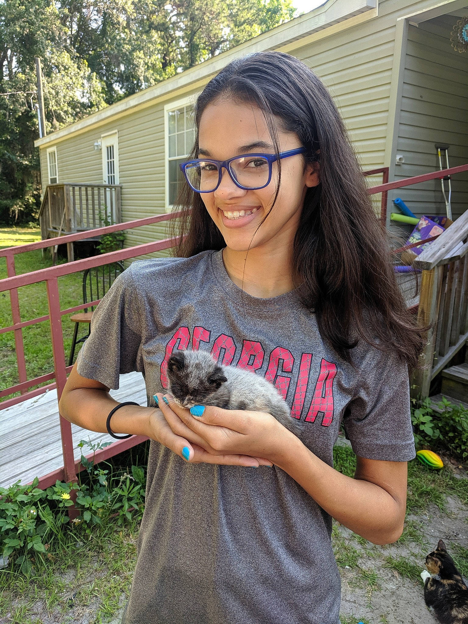 Kamea is registered to the contest to win money with this photo: canidae, fawn, glasses, joy, marsupial, person, plant, puppy, t_shirt, vacation, wildlife_biologist
