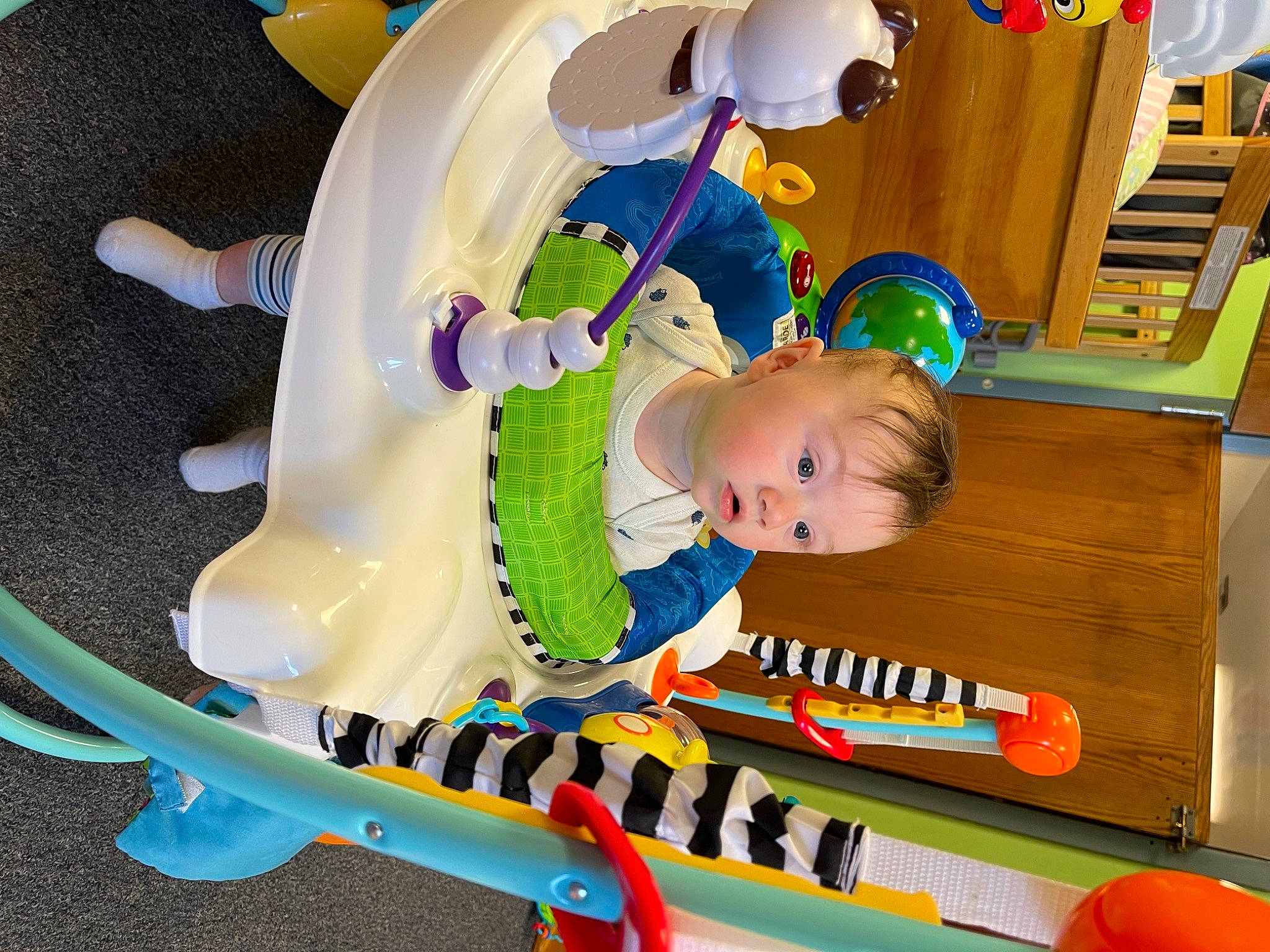 Rory joined the competition — help win amazing prizes! baby, baby_playing_with_toys, baby_products, baby_safety, baby_toddler_clothing, baby_toys, ball, child, circle, fun, indoor_games_and_sports, leisure, musical_instrument, person, play, recreation, room, shelf, surprise, toddler