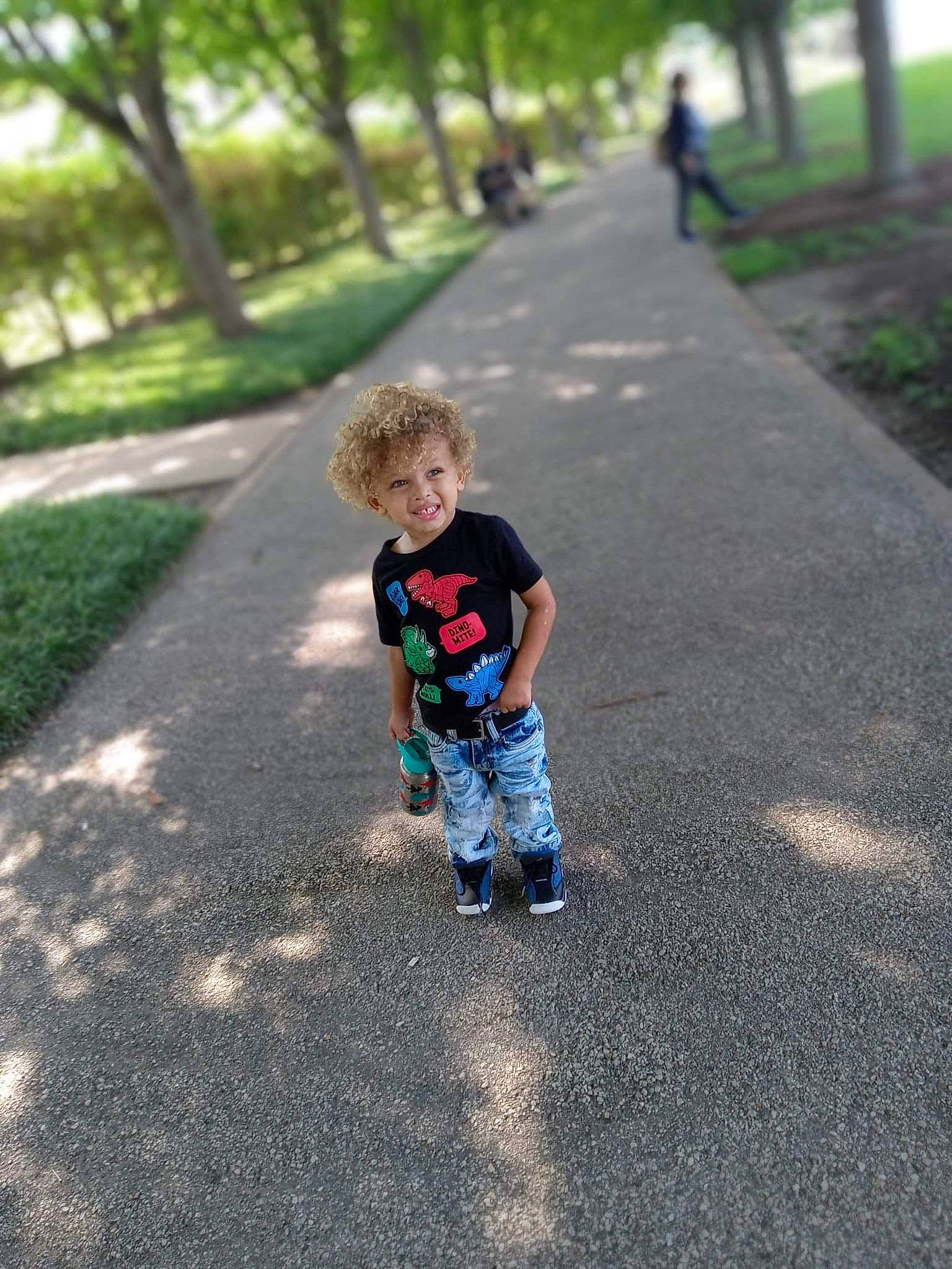 Brent joined the competition — help win amazing prizes! asphalt, child, electric_blue, fun, grass, joy, landscape, leaf, leisure, people_in_nature, person, plant, recreation, road, road_surface, sidewalk, t_shirt, tar, toddler, tree