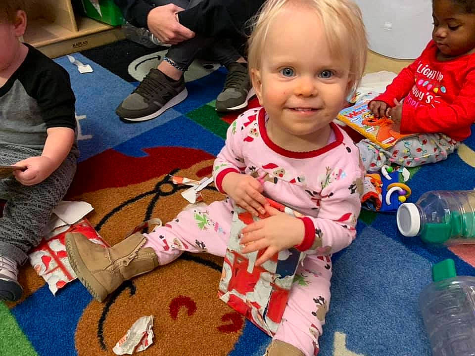 Jolene joined the competition — help win amazing prizes! adaptation, baby, child, christmas, christmas_eve, fun, holiday, joy, kindergarten, person, play, sharing, sitting, toddler, toy