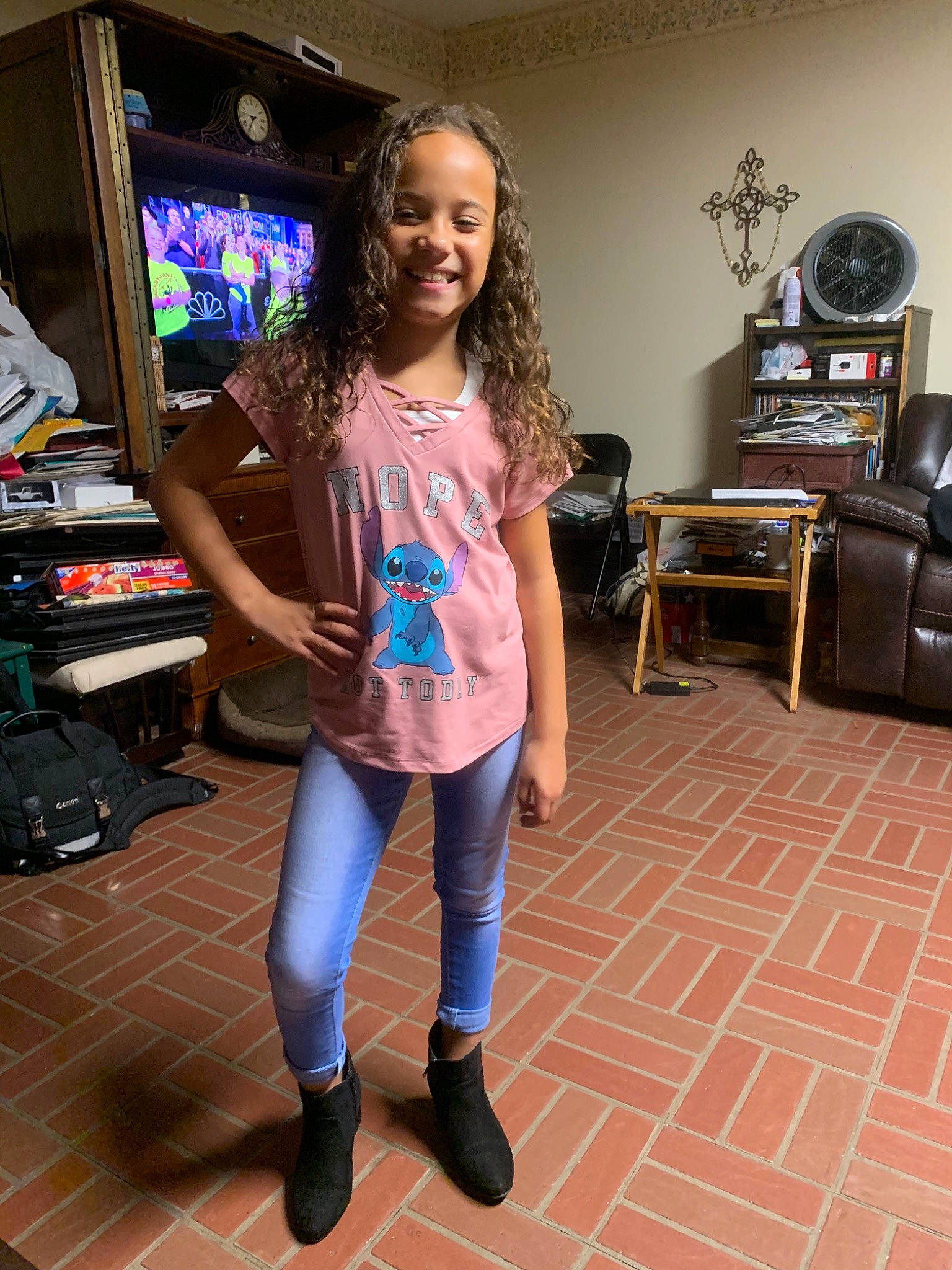 Grayce is registered to the contest to win money with this photo: dance_pad, electronic_device, electronics, flooring, footwear, jeans, joy, leg, leggings, long_hair, person, room, shoe, shoulder, t_shirt, technology, tights, trousers