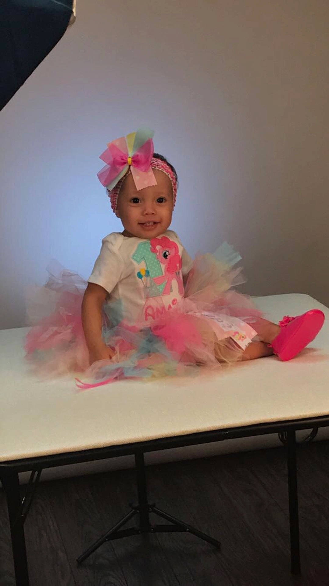 Amaia is registered to the contest to win money with this photo: art, child, clothing, human_positions, joy, pink, toddler, toy