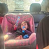 toddler, child, car_seat, pink, toy, toothbrush, toothpaste, vehicle, seatbelt, sunlight, rear_window, comfort, casual, candid, interior, seat, person, baby, cute, child_seat