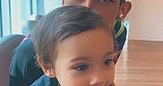 Kali joined the competition — help win amazing prizes! toddler, child, person, smiling, happy, indoor, window, casual_clothing, young_adult, face, hair, light, expression, playful, family, sibling, cute, joy, portrait, fun