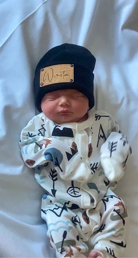 Winston joined the competition — help win amazing prizes! baby, baby_toddler_clothing, cap, carmine, child, collar, comfort, face, headwear, pattern, person, sitting, sleeve, toddler