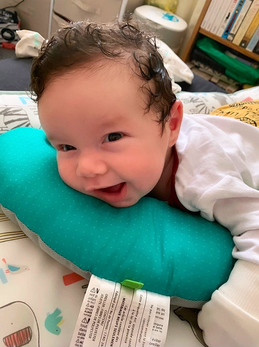 Layth is registered to the contest to win money with this photo: baby, baby_toddler_clothing, bib, blue, cheek, child, chin, comfort, eye, eyebrow, eyelash, green, happy, head, iris, nose, person, product, skin, smile
