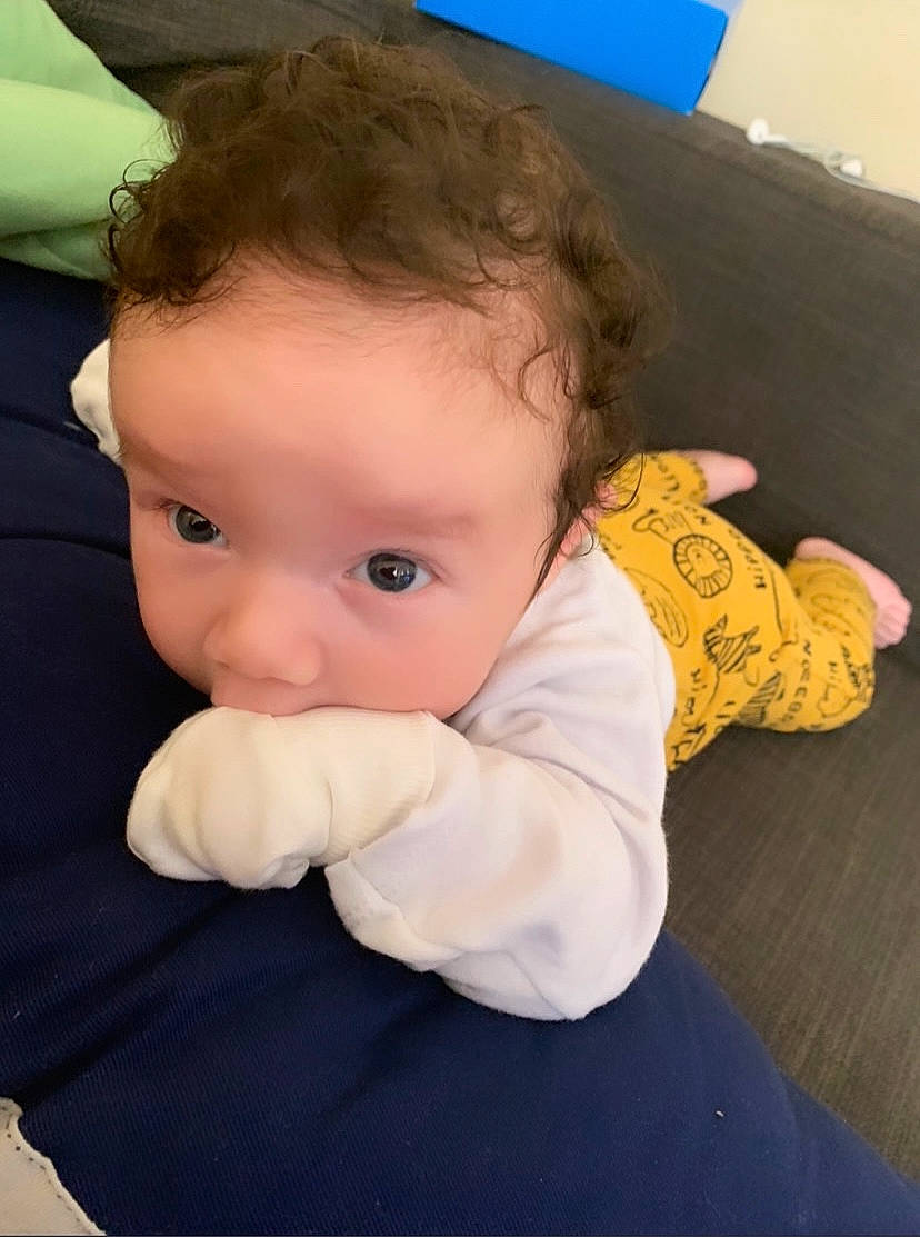 Layth joined the competition — help win amazing prizes! baby, baby_toddler_clothing, blue, cheek, chin, comfort, eye, eyebrow, facial_expression, finger, flooring, fun, happy, iris, nose, person, product, skin, sleeve, thumb