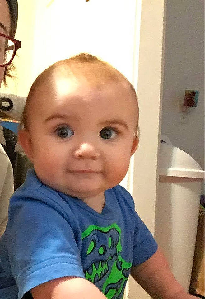 Colby is registered to the contest to win money with this photo: baby, baby_toddler_clothing, cheek, cool, ear, eye, eyebrow, eyelash, face, forehead, head, iris, lip, mouth, neck, nose, person, skin, sleeve, smile