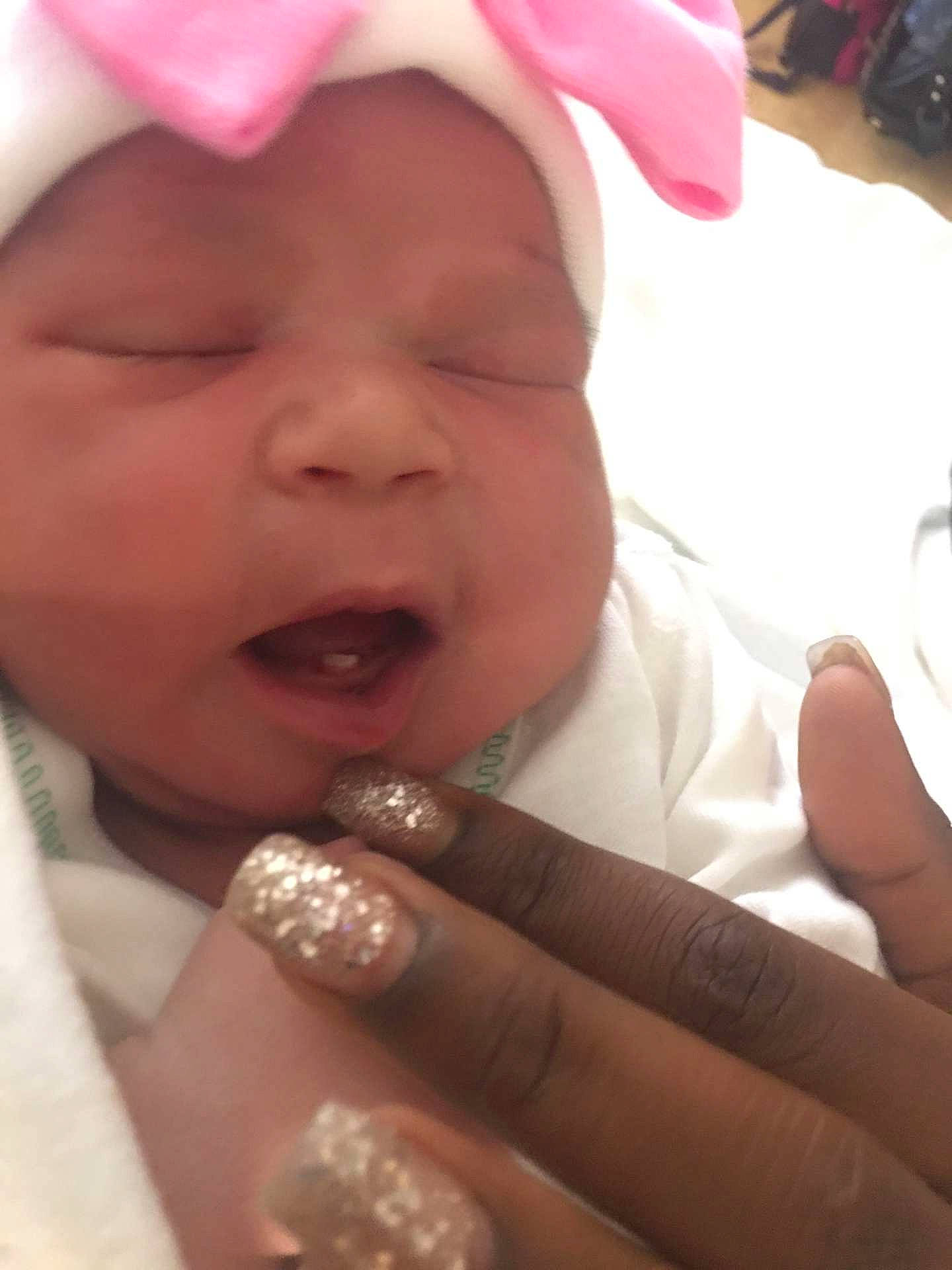 Jaizelle joined the competition — help win amazing prizes! baby, cheek, child, face, facial_expression, fashion_accessory, finger, hand, head, lip, mouth, nail, nose, person, pink, skin, smile, thumb, toddler